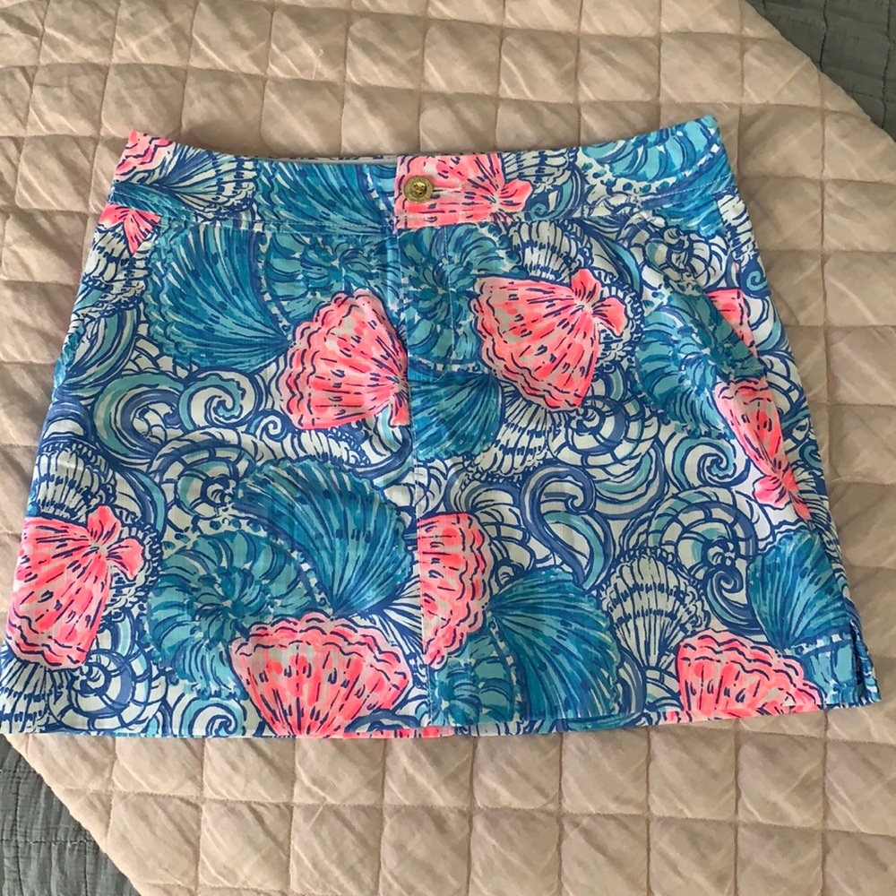 Lilly Pulitzer Skirt with shorts underneath.